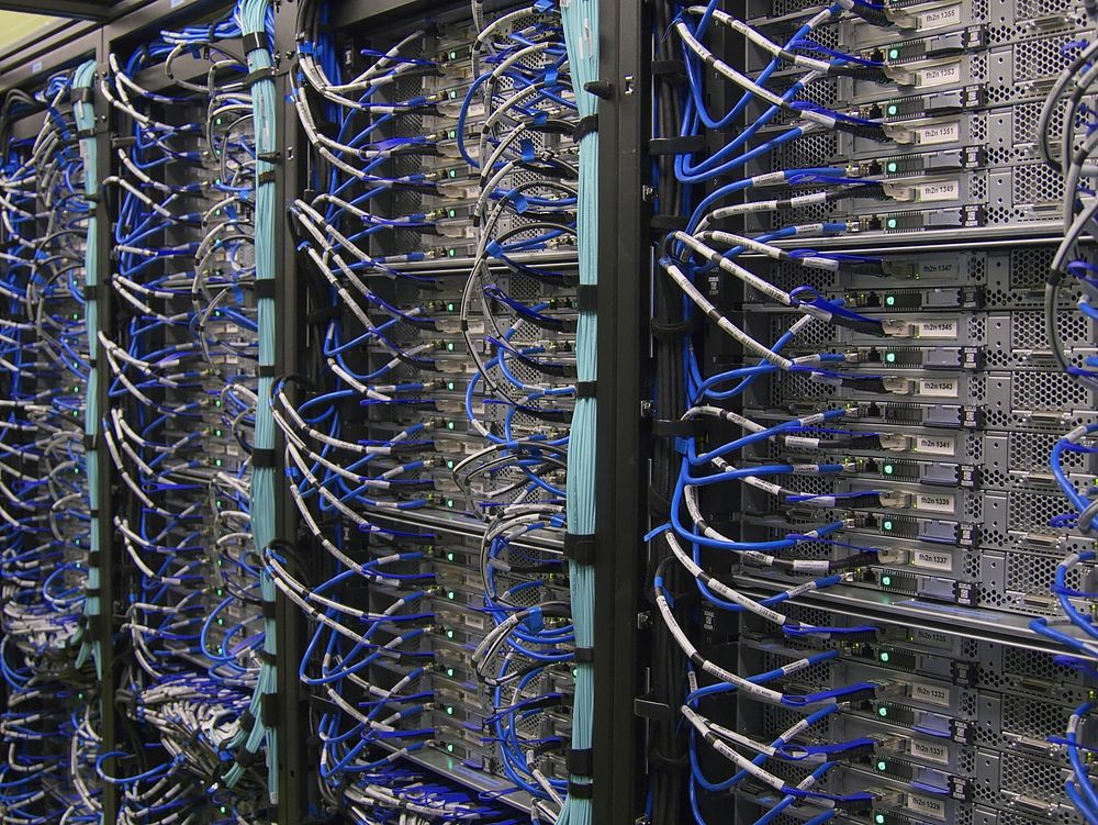 Server racks and network cabling representing routing and infrastructure labs